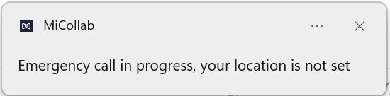 Screenshot of a MiCollab PC Client notification stating, Emergency call in progress, your location is not set